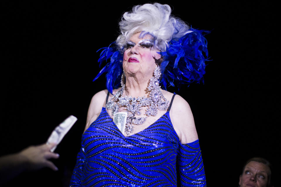 In this Sept. 2019 photo, Darcelle XV, performs in Portland, Ore. Walter C. Cole, better known as the iconic drag queen who performed for decades as Darcelle, has died of natural causes in Portland, Ore, on Thursday, March 24, 2023. (Beth Nakamura/The Oregonian via AP)