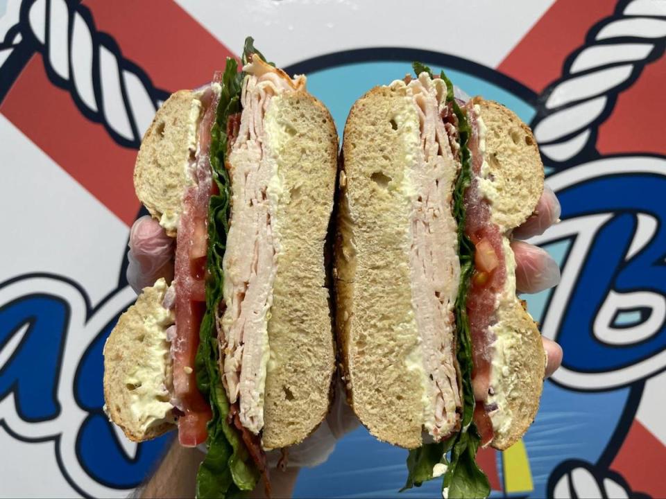 Bagel Boat’s Loaded Turkey Sandwich on a bagel comes with turkey, bacon, vegetable cream cheese, lettuce, tomato and onion.