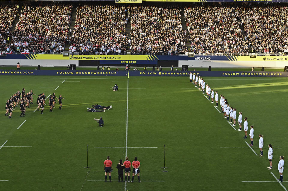 New Zealand players, left, perform the haka toward England players, right, before the final of the women's rugby World Cup at Eden Park in Auckland, New Zealand, Saturday, Nov.12, 2022. (Andrew Cornaga/Photosport via AP)