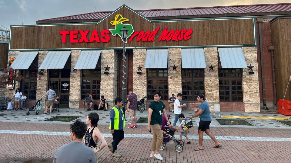 A Texas Road House restaurant near the center of Camp Humphreys, seen on the Fourth of July, 2024. - Brad Lendon/CNN