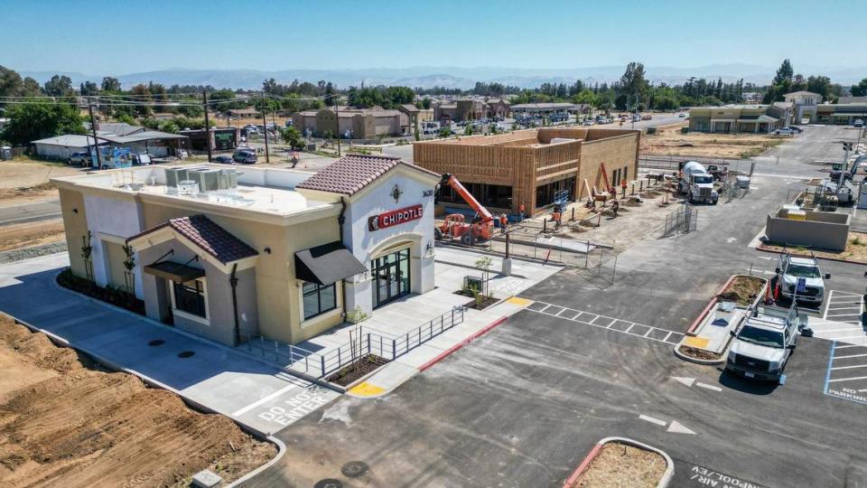 Construction continues on the Loma Vista Marketplace in east Clovis where a number of businesses including Chipotle already have signs up, photographed on Wednesday, May 29, 2024.