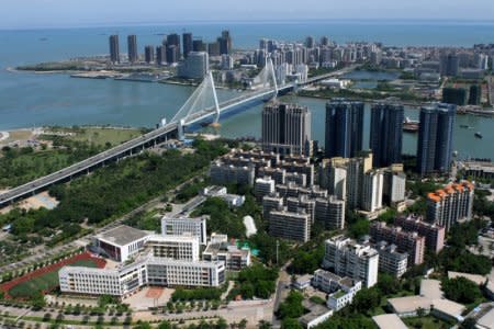 The Haikou Century Bridge connecting Haidian Island and the main Haikou area is pictured in Haikou, Hainan district, China May 6, 2018. Picture taken May 6, 2018. China Daily via REUTERS