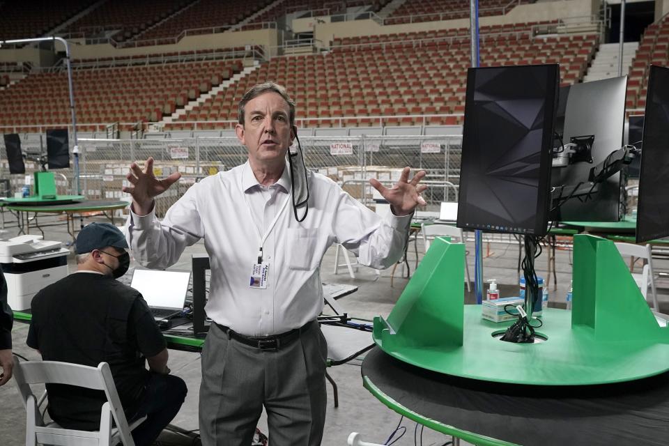 Former Arizona Secretary of State Ken Bennett talks about overseeing a 2020 election ballot audit ordered by the Republican lead Arizona Senate at the Arizona Veterans Memorial Coliseum, during a news conference Thursday, April 22, 2021, in Phoenix. The equipment used in the November election won by President Joe Biden and the 2.1 million ballots were moved to the site Thursday so Republicans in the state Senate who have expressed uncertainty that Biden's victory was legitimate can recount them and audit the results. (AP Photo/Ross D. Franklin)