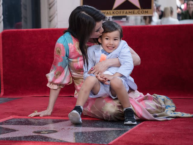 <p>Morgan Lieberman/FilmMagic</p> Lucy Liu and her son, Rockwell, at Lucy Liu's Hollywood Walk of Fame star ceremony on May 01, 2019.