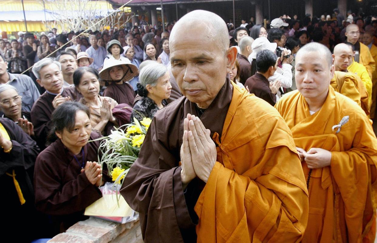 <span class="caption">Zen Buddhist monk Thich Nhat Hanh praying during a three-day requiem for the souls of Vietnam War victims in 2007.</span> <span class="attribution"><a class="link " href="https://www.gettyimages.com/detail/news-photo/zen-buddhist-monk-leader-thich-nhat-hanh-prays-during-a-news-photo/73929011?adppopup=true" rel="nofollow noopener" target="_blank" data-ylk="slk:Hoang Dinh Nam/AFP via Getty Images;elm:context_link;itc:0;sec:content-canvas">Hoang Dinh Nam/AFP via Getty Images</a></span>