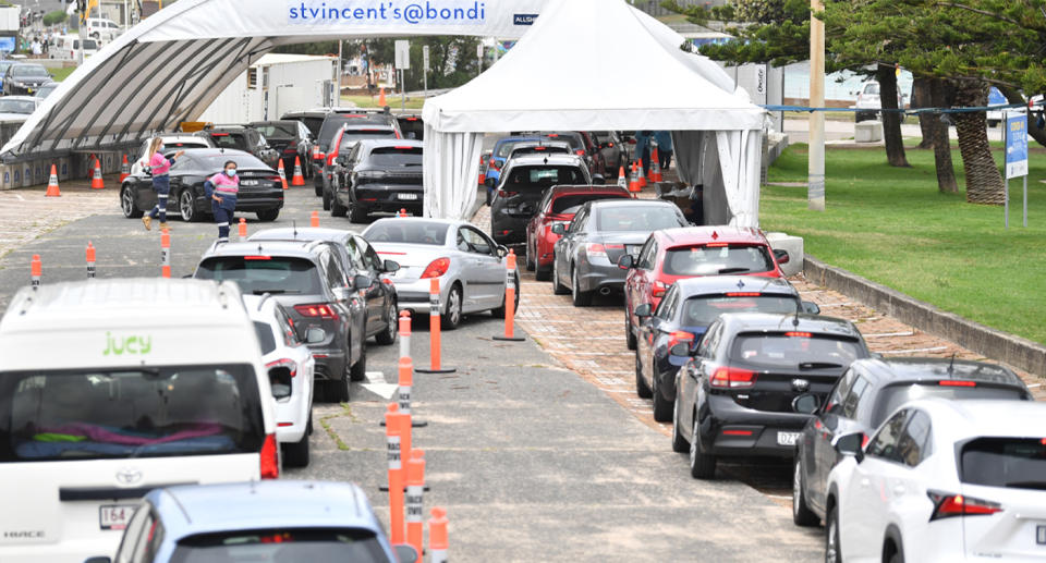 Two huge queues in Bondi Beach for coronavirus testing.