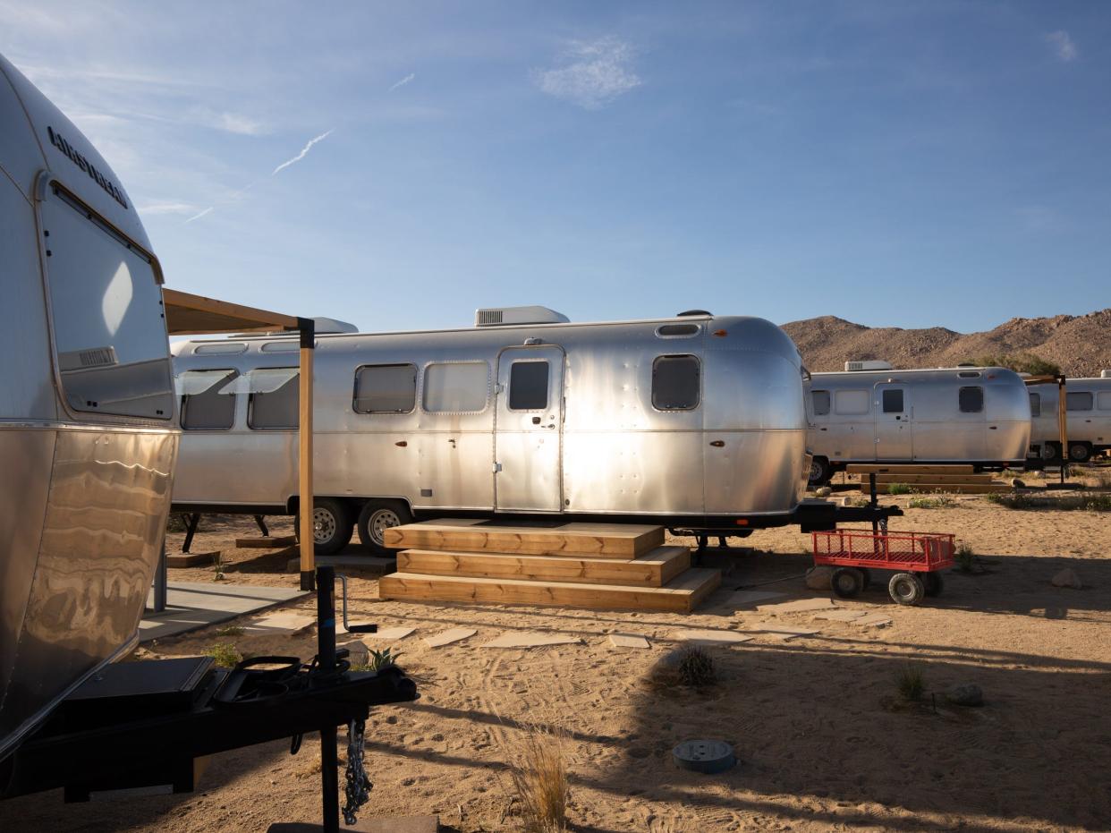 A row of Airstream trailers at Autocamp's Joshua Tree location.