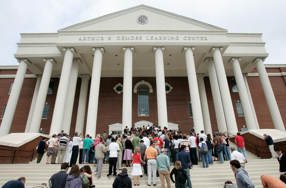 Mourners wait to get into Arthur S. DeMoss Learning Center of Liberty University to pay respects to the late Rev. Jerry Falwell at a viewing in 2007.