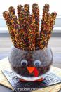 <p>Place this Thanksgiving arrangement in the <a href="https://www.countryliving.com/entertaining/g2130/thanksgiving-centerpieces/" rel="nofollow noopener" target="_blank" data-ylk="slk:center of the table;elm:context_link;itc:0;sec:content-canvas" class="link ">center of the table</a>. Kids will love getting to gobble on a <a href="https://www.countryliving.com/food-drinks/g1384/thanksgiving-desserts/" rel="nofollow noopener" target="_blank" data-ylk="slk:delicious dessert;elm:context_link;itc:0;sec:content-canvas" class="link ">delicious dessert</a> all night long.</p><p><strong>Get the tutorial at <a href="http://insidebrucrewlife.com/2014/11/chocolate-covered-pretzels-turkey-jar" rel="nofollow noopener" target="_blank" data-ylk="slk:Inside Bru Crew Life;elm:context_link;itc:0;sec:content-canvas" class="link ">Inside Bru Crew Life</a>.</strong> </p><p><a class="link " href="https://www.amazon.com/DECORA-Pieces-Wiggle-Googly-Self-adhesive/dp/B01LWIYJH3/?tag=syn-yahoo-20&ascsubtag=%5Bartid%7C10050.g.1201%5Bsrc%7Cyahoo-us" rel="nofollow noopener" target="_blank" data-ylk="slk:SHOP GOOGLY EYES;elm:context_link;itc:0;sec:content-canvas">SHOP GOOGLY EYES</a></p>