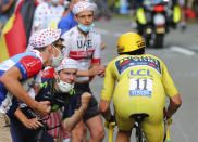 Slovenia's Primoz Roglic, who lost his overall leader's yellow jersey, competes during stage 20 of the Tour de France cycling race, an individual time trial over 36.2 kilometers (22.5 miles), from Lure to La Planche des Belles Filles, France, Saturday, Sept. 19, 2020. (AP Photo/Thibault Camus)