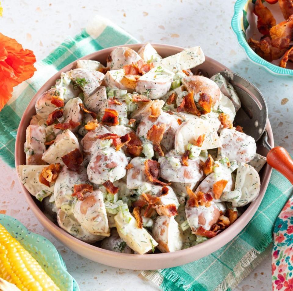 <p>No cookout is complete without a classic potato salad. This one has all the elements we love about potato salad (creamy dressing and fresh dill), plus so much more (hello, crunchy bacon bits!). </p><p><a href="https://www.thepioneerwoman.com/food-cooking/recipes/a35888627/red-potato-salad/" rel="nofollow noopener" target="_blank" data-ylk="slk:Get the recipe.;elm:context_link;itc:0;sec:content-canvas" class="link "><strong>Get the recipe. </strong></a></p><p><a class="link " href="https://go.redirectingat.com?id=74968X1596630&url=https%3A%2F%2Fwww.walmart.com%2Fsearch%2F%3Fquery%3Dpioneer%2Bwoman%2Bserving%2Bbowls&sref=https%3A%2F%2Fwww.thepioneerwoman.com%2Ffood-cooking%2Fmeals-menus%2Fg36353420%2Ffourth-of-july-side-dishes%2F" rel="nofollow noopener" target="_blank" data-ylk="slk:SHOP SERVING BOWLS;elm:context_link;itc:0;sec:content-canvas">SHOP SERVING BOWLS</a></p>