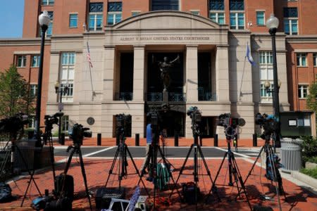 Television cameras are positioned outside the U.S. District Courthouse where former Trump campaign manager Paul Manafort is being tried on charges stemming from Special Counsel Robert Mueller's ongoing investigation into Russia's role in the 2016 U.S. presidential election, in Alexandria, Virginia, U.S., August 7, 2018. REUTERS/Brian Snyder