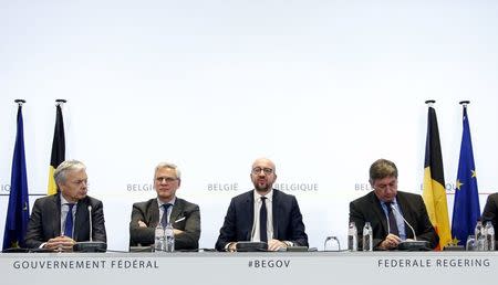 (L-R) Belgium's Foreign Minister Didier Reynders, Employment and Economy Minister Kris Peeters, Prime Minister Charles Michel and Interior Minister Jan Jambon hold a joint news conference in Brussels, November 22, 2015, after security was tightened in Belgium following the fatal attacks in Paris. REUTERS/Francois Lenoir