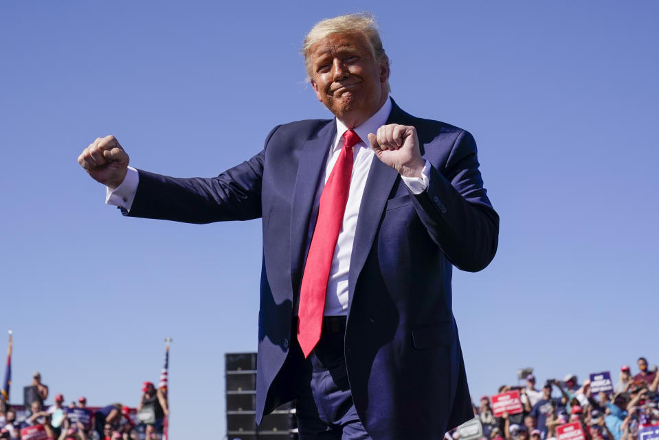 President Donald Trump dances after speaking at a campaign rally at Prescott Regional Airport, Monday, Oct. 19, 2020, in Prescott, Ariz. (AP Photo/Alex Brandon)