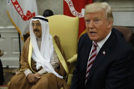 U.S. President Donald Trump (R) meets with Emir of Kuwait Sabah Al-Ahmad Al-Jaber Al-Sabah (L) in the Oval Office at the White House in Washington, U.S., September 7, 2017. REUTERS/Kevin Lamarque