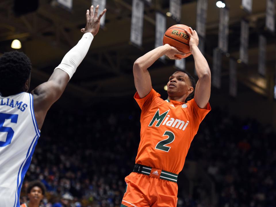 Miami guard Isaiah Wong shoots during a game against Duke in Jan. 2022.