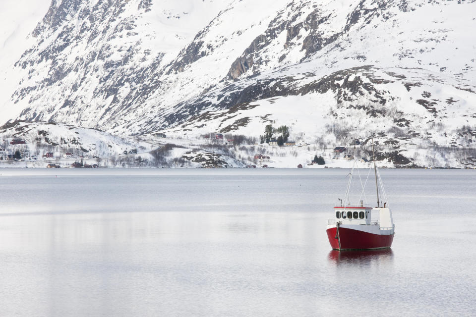 Red fishing boat moored near Ersfjordboton, Tromso