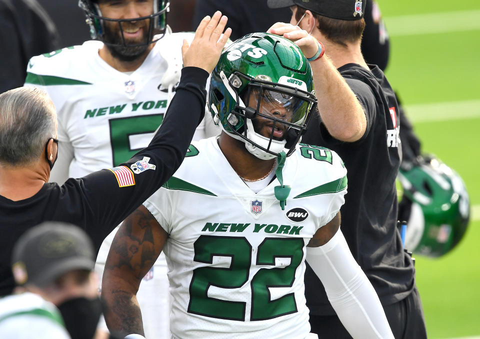 Nov 22, 2020; Inglewood, California, USA; New York Jets running back La’Mical Perine (22) is congratulated after scoring a touchdown against the Los Angeles Chargers in the first quarter at SoFi Stadium. Mandatory Credit: Jayne Kamin-Oncea-USA TODAY Sports