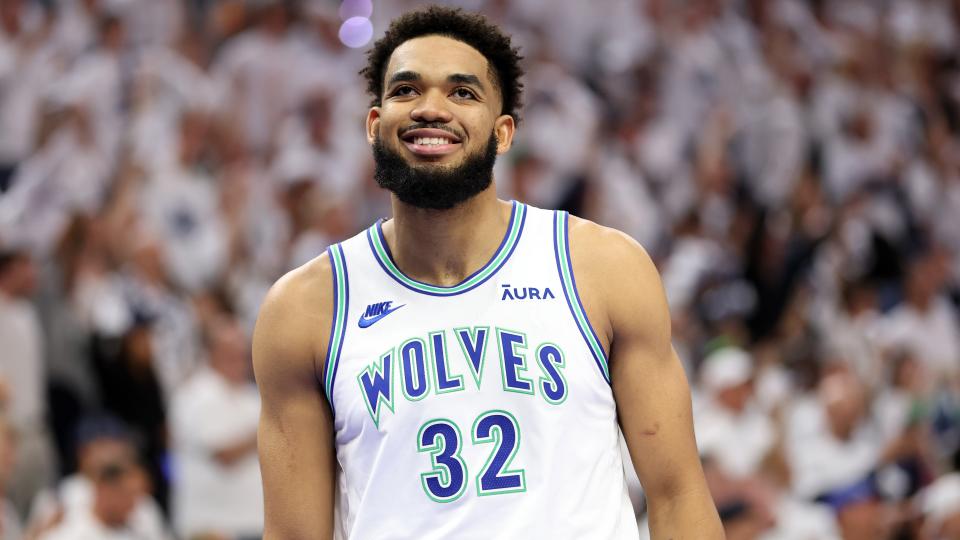 Minnesota Timberwolves center Karl-Anthony Towns (32) reacts in the first quarter against the Dallas Mavericks during game one of the western conference finals for the 2024 NBA playoffs at Target Center