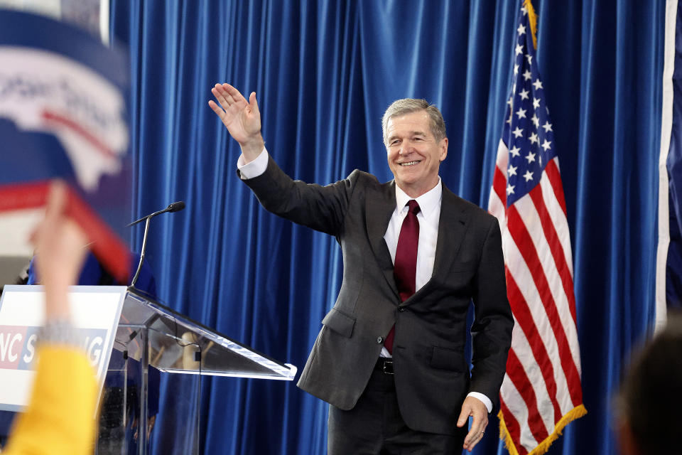 North Carolina Governor Roy Cooper steps to the podium to give remarks at a Josh Stein for Governor Rally at Shaw University in Raleigh, N.C., Tuesday, Oct. 10, 2023. (AP Photo/Karl B DeBlaker)