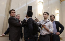 BEIJING, CHINA - MAY 3: Journalists record from a loudspeaker during a meeting of U.S. Treasury Secretary Timothy Geithner and China's Vice Premier Li Keqiang at the Great Hall of the People on May 4, 2012 in Beijing. Hillary Clinton is in China for bilateral talks and has called on China to protect human rights. (Photo by Jason Lee/Pool/Getty Images)