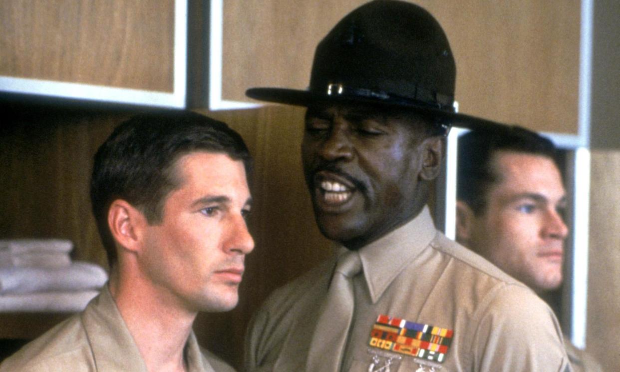 <span>Lou Gossett Jr, centre, with Richard Gere, left, and David Keith, in An Officer and a Gentleman.</span><span>Photograph: Paramount Pictures/Allstar</span>