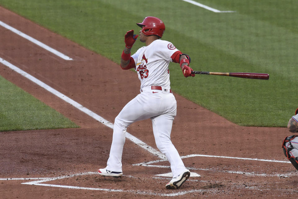 St. Louis Cardinals second baseman Edmundo Sosa hits a RBI single against the Miami Marlins during the second inning of a baseball game Monday, June 14, 2021, in St. Louis. (AP Photo/Joe Puetz)