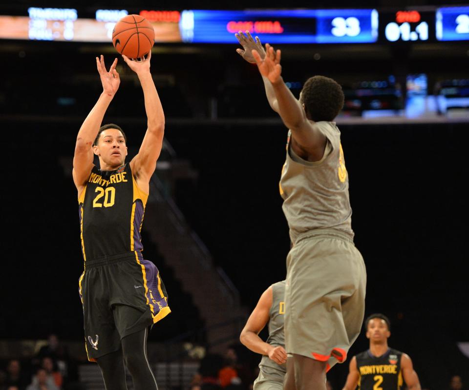 Montverde Academy senior Ben Simmons (20) takes a shot during the championship game against Oak Hill Academy 2015 Dick's Sporting Goods High School Nationals at Madison Square Garden in New York.