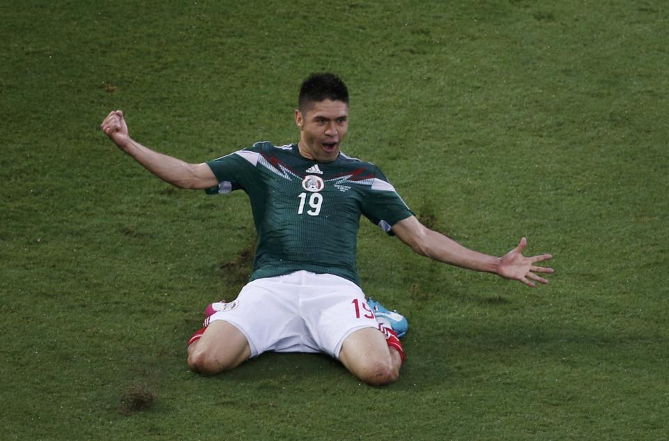 Mexico's Peralta celebrates after scoring a goal