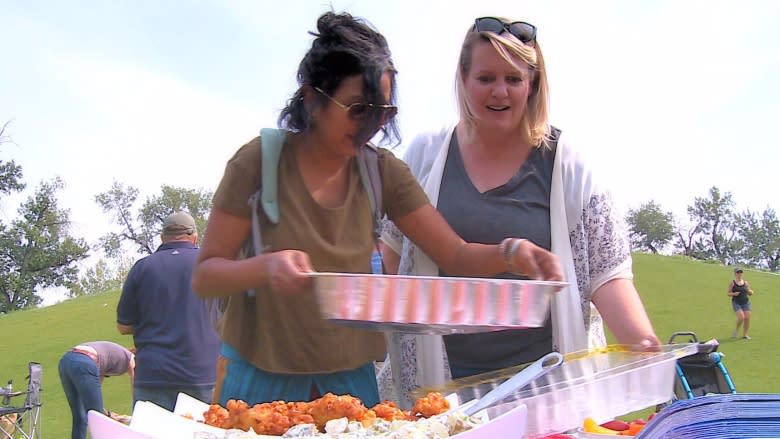 Samosas, picnic blankets and chocolate chip cookies unite 500 Calgarians after Charlottesville violence