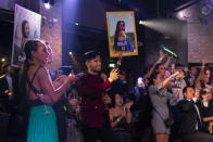 Supporters of Cheryl Yao cheer during the finals of the 2019 Miss Universe Singapore beauty pageant at Zouk.