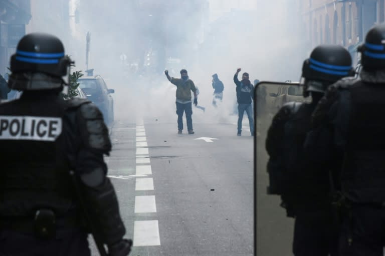 Police face protesters in Toulouse on Thursday, when around 200 high schools were blocked by fresh demonstrations