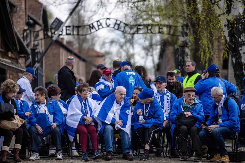 Holocaust survivors and other participants gather on April 18, 2023, for the annual March of The Living to honor the victims of the Holocaust at the Auschwitz concentration camp in Oswiecim, Poland.