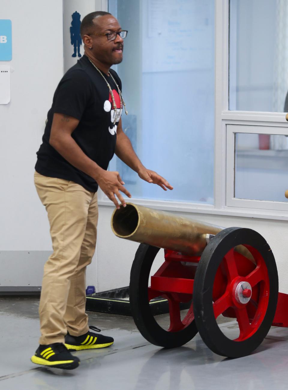 Executive Director Benjamin Cannon and a cannon during a rehearsal of The Nutcracker at the Wilmington Ballet Academy of the Dance, Sunday, Nov. 5, 2023.