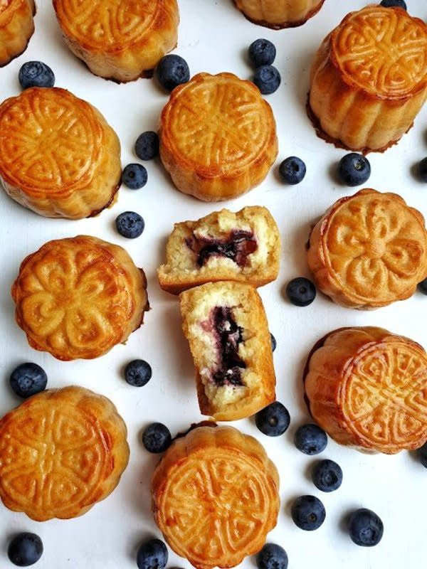 <p>Tash Cakes</p><p>Make mini moocakes stuffed with a sticky sweet blueberry filling</p><p><strong>Get the recipe here: <a href="https://www.tashcakes.com/2019/08/blueberry-cheesecake-mooncakes-with.html" rel="nofollow noopener" target="_blank" data-ylk="slk:Blueberry Cheesecake Mooncake;elm:context_link;itc:0;sec:content-canvas" class="link ">Blueberry Cheesecake Mooncake</a></strong></p>