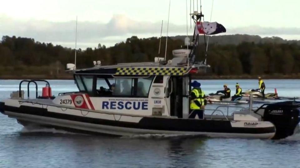 Searchers on Lake Macquarie. Picture: Channel 9