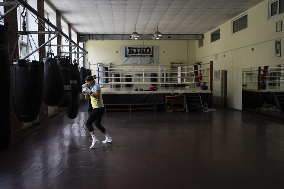 Ukrainian boxer Anna Lysenko trains at Kiko Boxing Club in Kyiv, Ukraine, Tuesday, July 11, 2023. Lysenko dedicates long hours preparing for next year's Paris Olympics despite the unsettling sounds of explosions booming outside. Lysenko nearly won an Olympic medal at the Tokyo Games in 2021 but her training routine this time has been disrupted by the war in Ukraine. (AP Photo/Jae C. Hong)