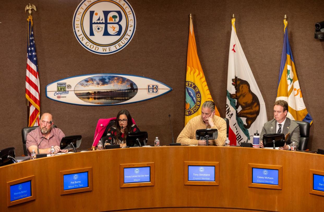 Huntington Beach city council members from left: council member Pat Burns, Mayor Grace Van Der