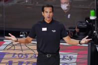 Miami Heat head coach Erik Spoelstra watches the action during the second half of an NBA conference final playoff basketball game against the Boston Celtics Friday, Sept. 25, 2020, in Lake Buena Vista, Fla. (AP Photo/Mark J. Terrill)