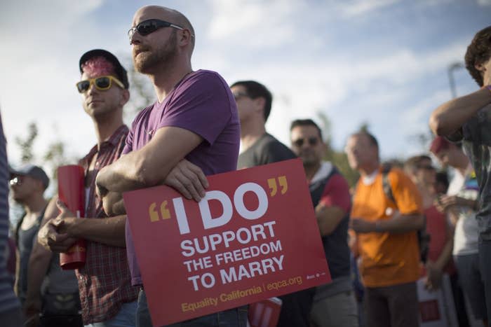 People celebrate the Supreme Court ruling on marriage for same-sex couples on June 26, 2015, in West Hollywood, California.