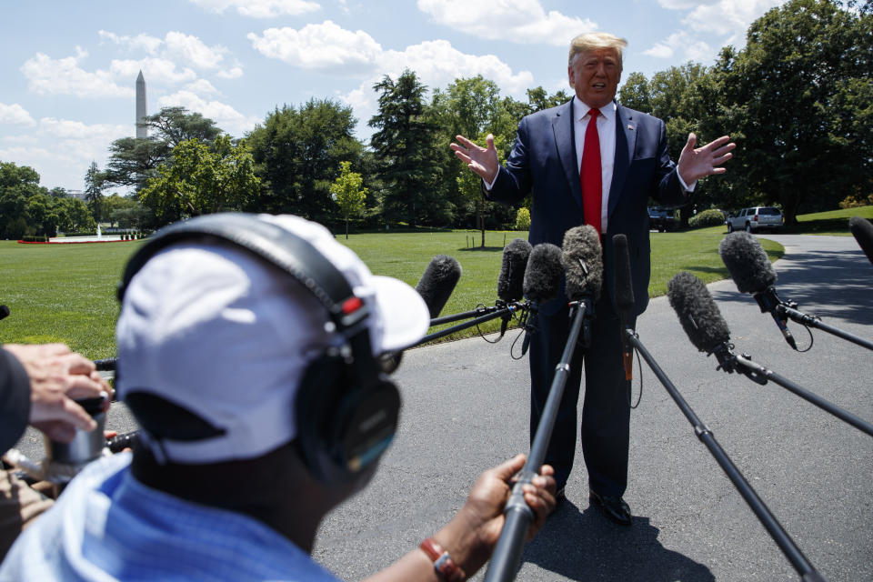 President Donald Trump talks with reporters before departing to Japan for the G20 summit on the South Lawn of the White House, Wednesday, June 26, 2019, in Washington. (AP Photo/Evan Vucci)