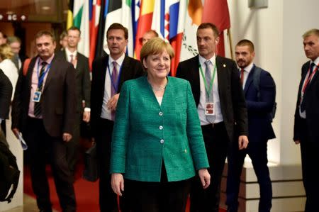 German Chancellor Angela Merkel leaves a European Union leaders summit in Brussels, Belgium, June 29, 2018. REUTERS/Eric Vidal