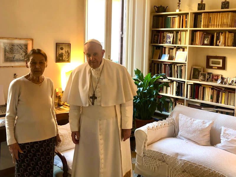 Pope Francis and poetess and Holocaust survivor, Edith Brick, pose for photographs in Rome