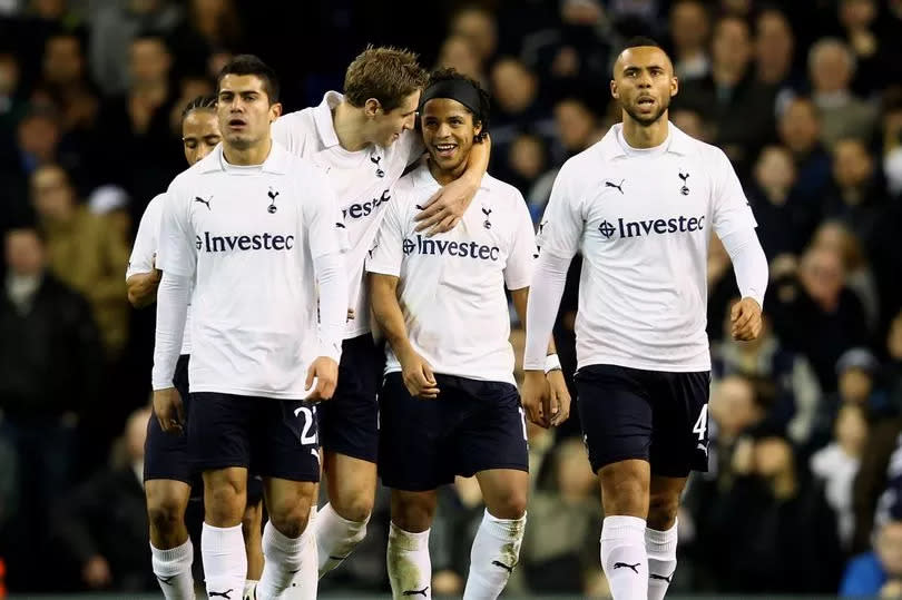 Giovani Dos Santos of Spurs is congratulated by his captain Michael Dawson after scoring his team's third goal during the FA Cup Third Round match between Tottenham Hotspur and Cheltenham Town at White Hart Lane on January 7, 2012.