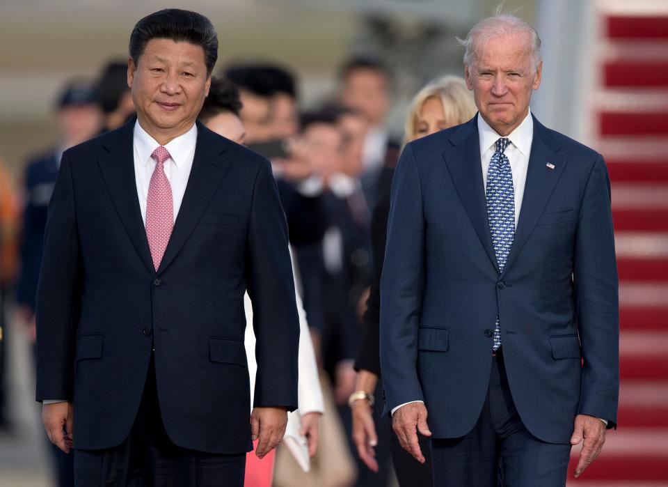 Chinese President Xi Jinping and President Joe Biden on Sept. 24, 2015, at Andrews Air Force Base, Maryland.