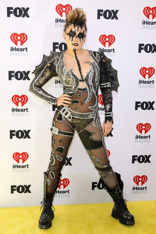 <p>Frazer Harrison/Getty</p> JoJo Siwa wears edgy look inspired by KISS at the 2024 iHeartRadio Music Awards on April 1