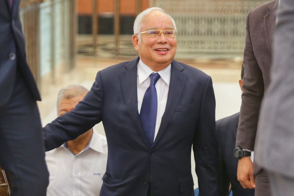 Datuk Seri Najib Razak is pictured at the Parliament lobby October 15, 2019. — Picture by Ahmad Zamzahuri