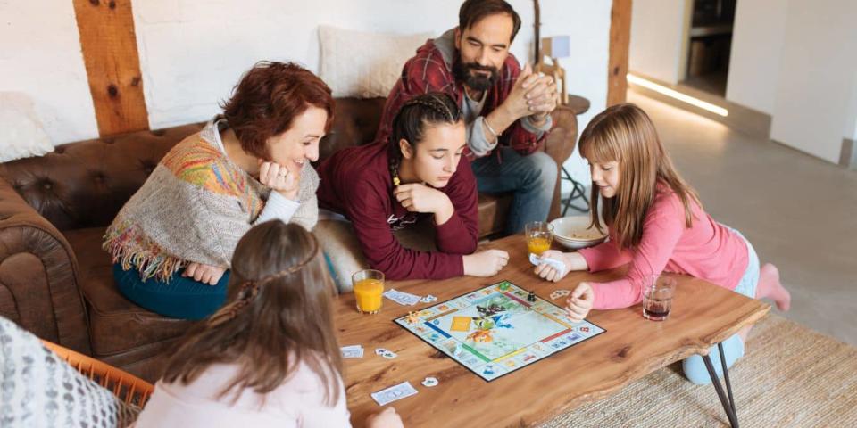 family playing board games- minute to win it games