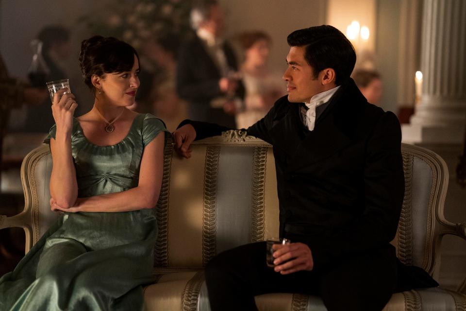 Anne (Dakota Johnson) is wooed by the dashing and mysterious Mr. Elliot (Henry Golding) in "Persuasion."