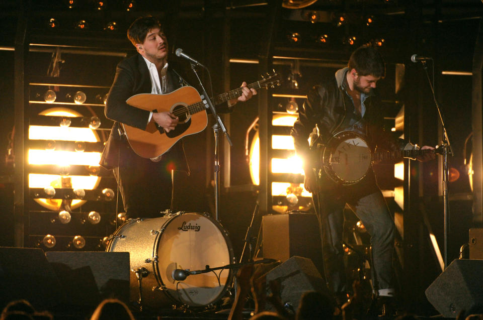 Marcus Mumford, left, and Winston Marshall, of musical group Mumford & Sons, perform at the 55th annual Grammy Awards on Sunday, Feb. 10, 2013, in Los Angeles. (Photo by John Shearer/Invision/AP)
